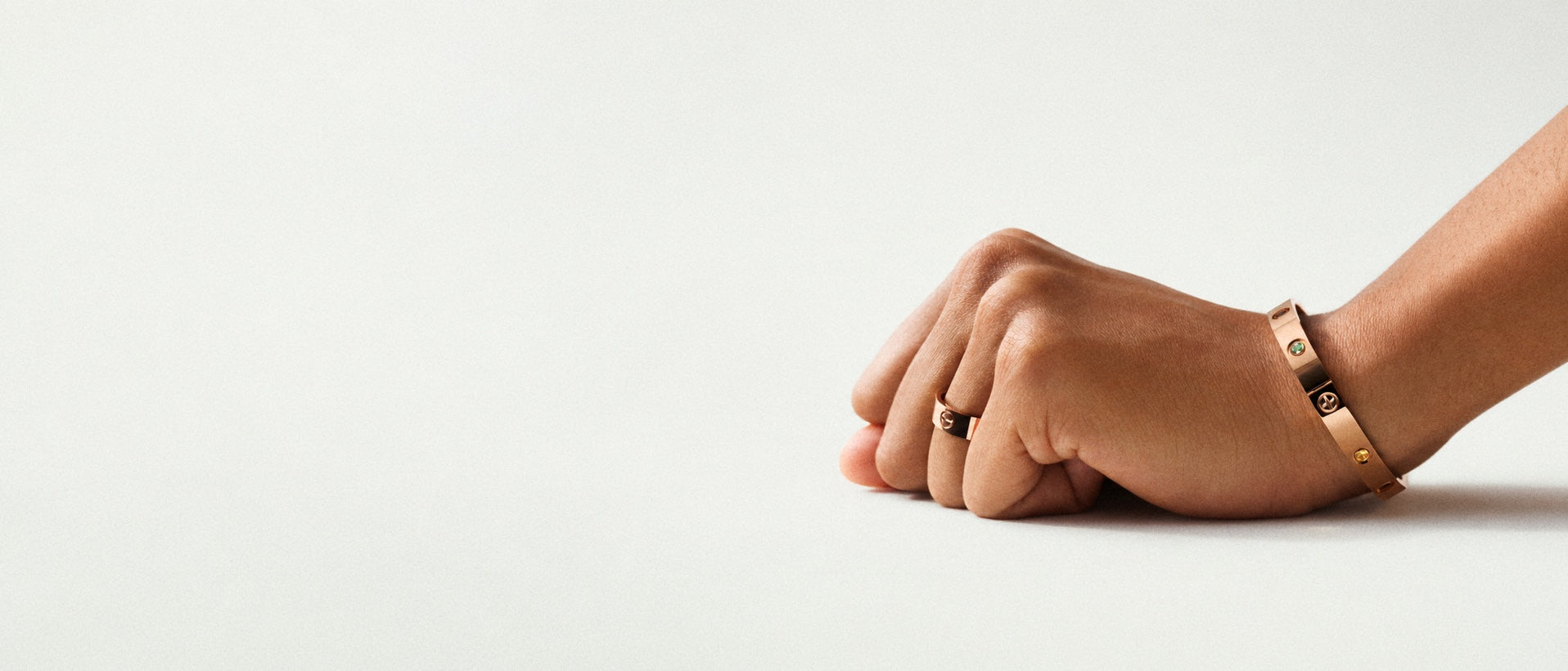 Gold bracelet and ring worn together