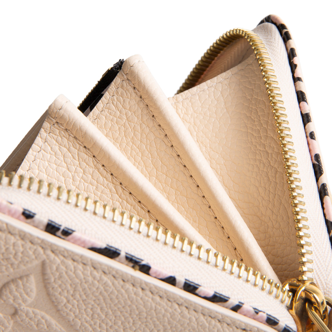 LOUIS VUITTON Wild at Heart Monogram Empreinte Zippy Wallet