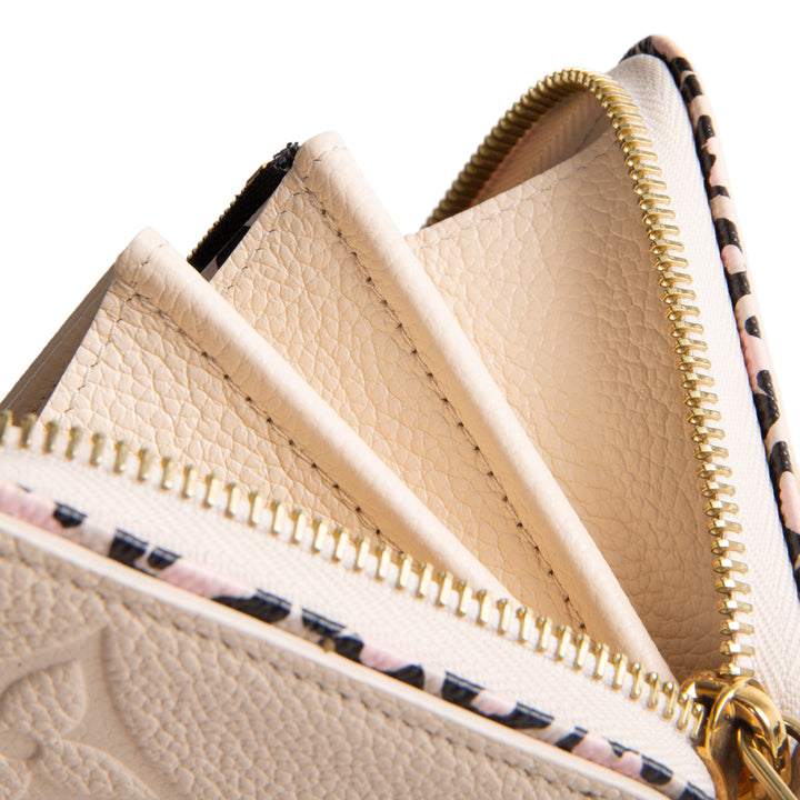 LOUIS VUITTON Wild at Heart Monogram Empreinte Zippy Wallet