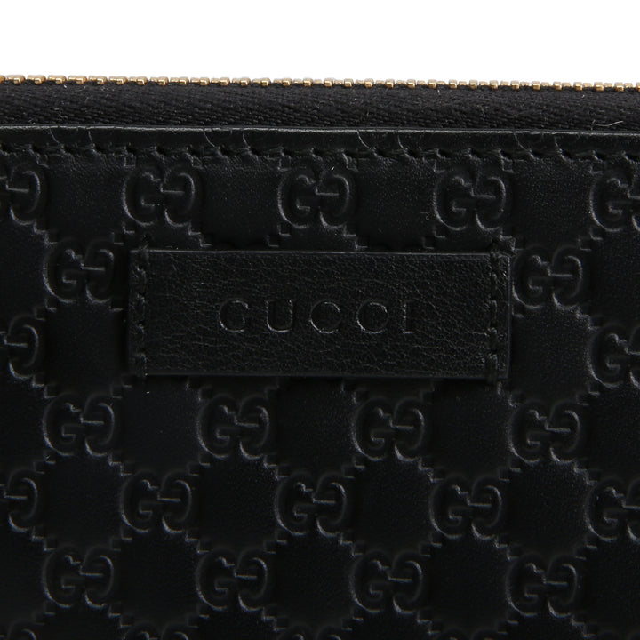 GUCCI Microguccissima Zip Around Wallet