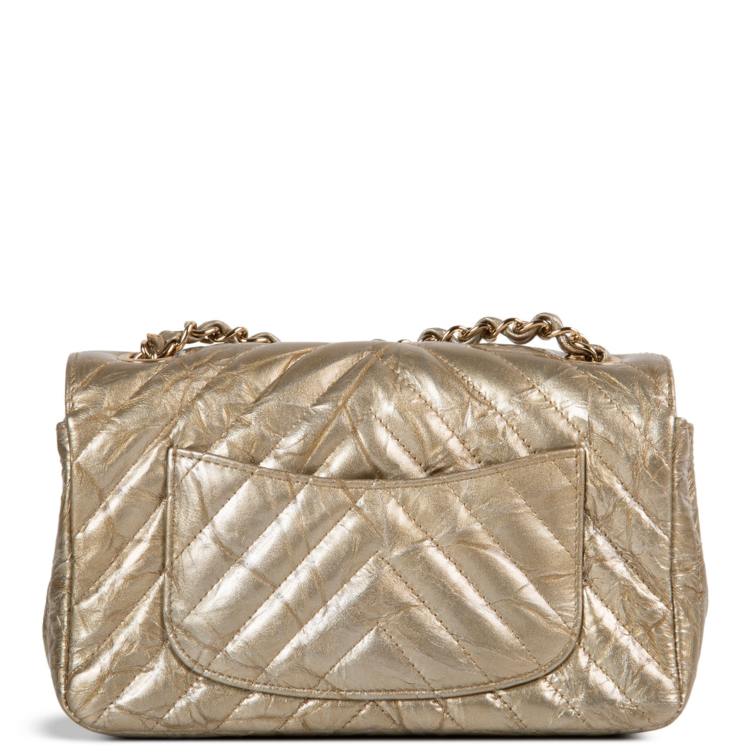 CHANEL Crumpled Patent Chevron Mini Rectangular Single Flap Bag - Metallic Gold