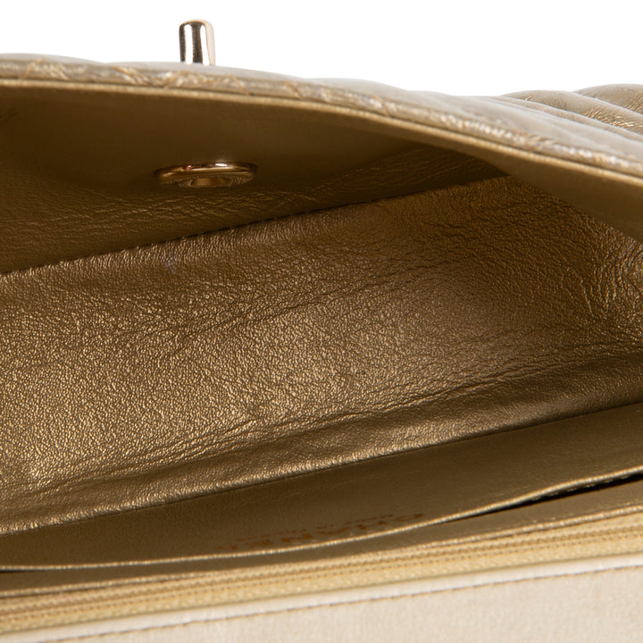 CHANEL Crumpled Patent Chevron Mini Rectangular Single Flap Bag - Metallic Gold