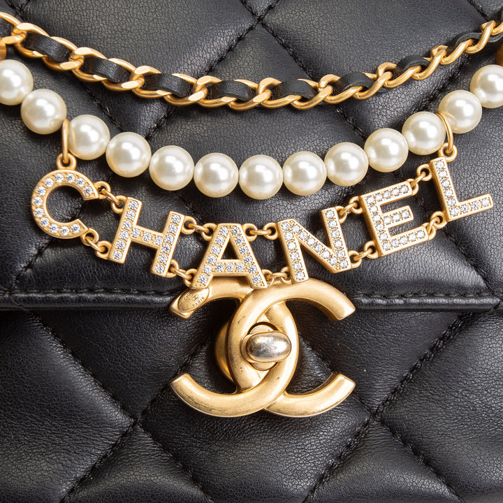 CHANEL Pearl Logo Lambskin Flap Bag - Black