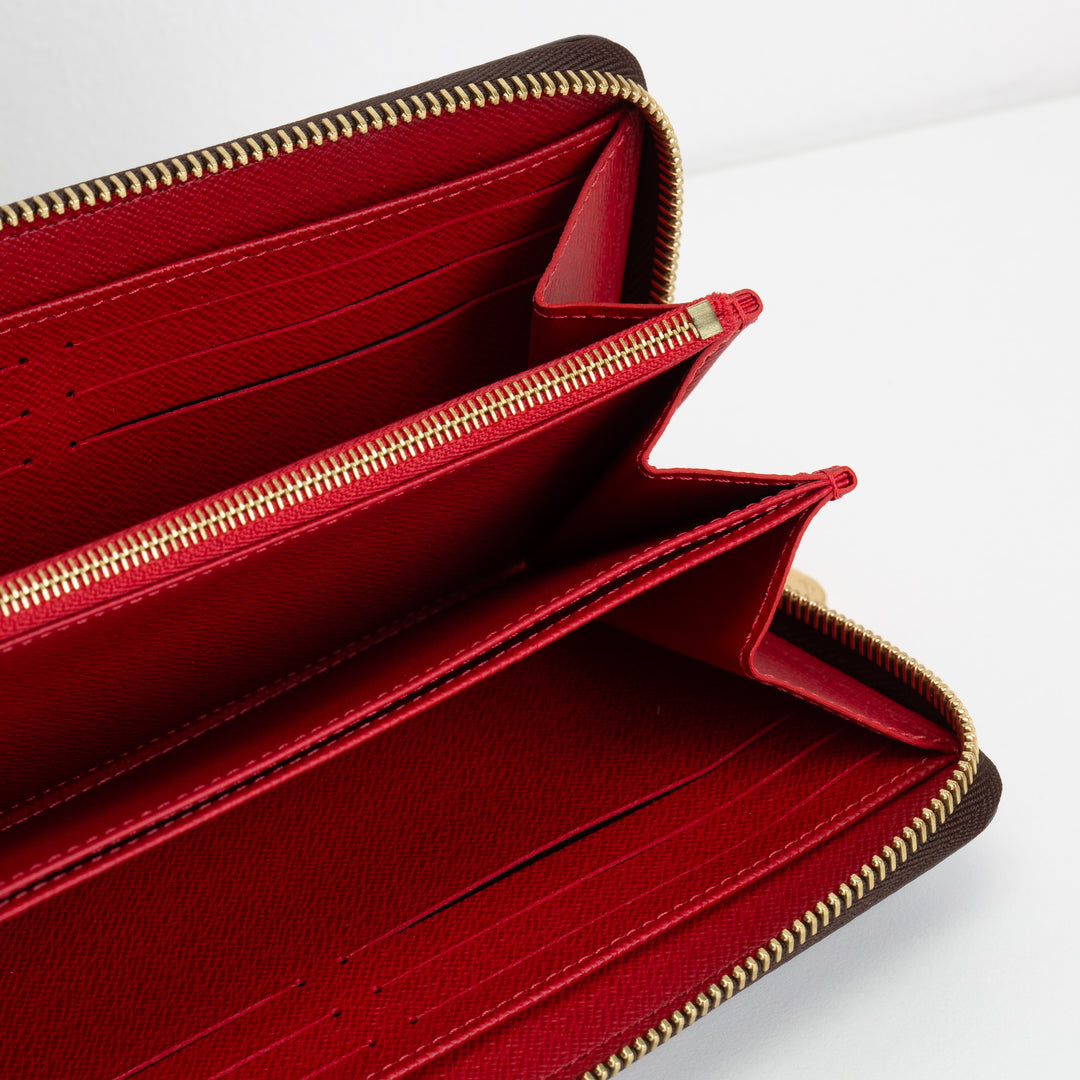 LOUIS VUITTON Monogram World Tour Zippy Wallet