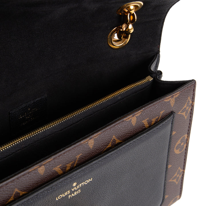 LOUIS VUITTON Victoire Monogram Handbag