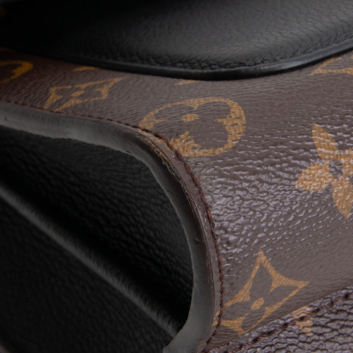 LOUIS VUITTON Victoire Monogram Handbag