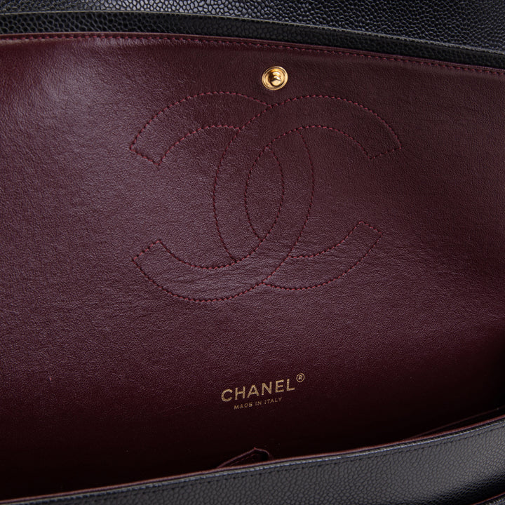 CHANEL Quilted Caviar Maxi Double Flap Bag - Black