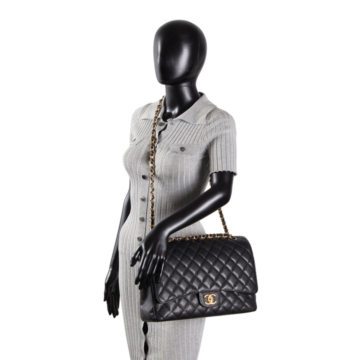 CHANEL Quilted Caviar Maxi Double Flap Bag - Black