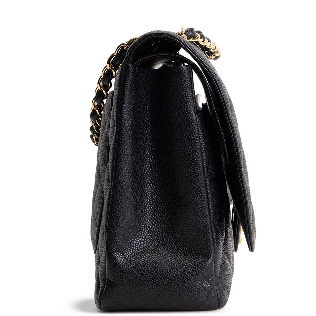 CHANEL Quilted Caviar Maxi Double Flap Bag - Black