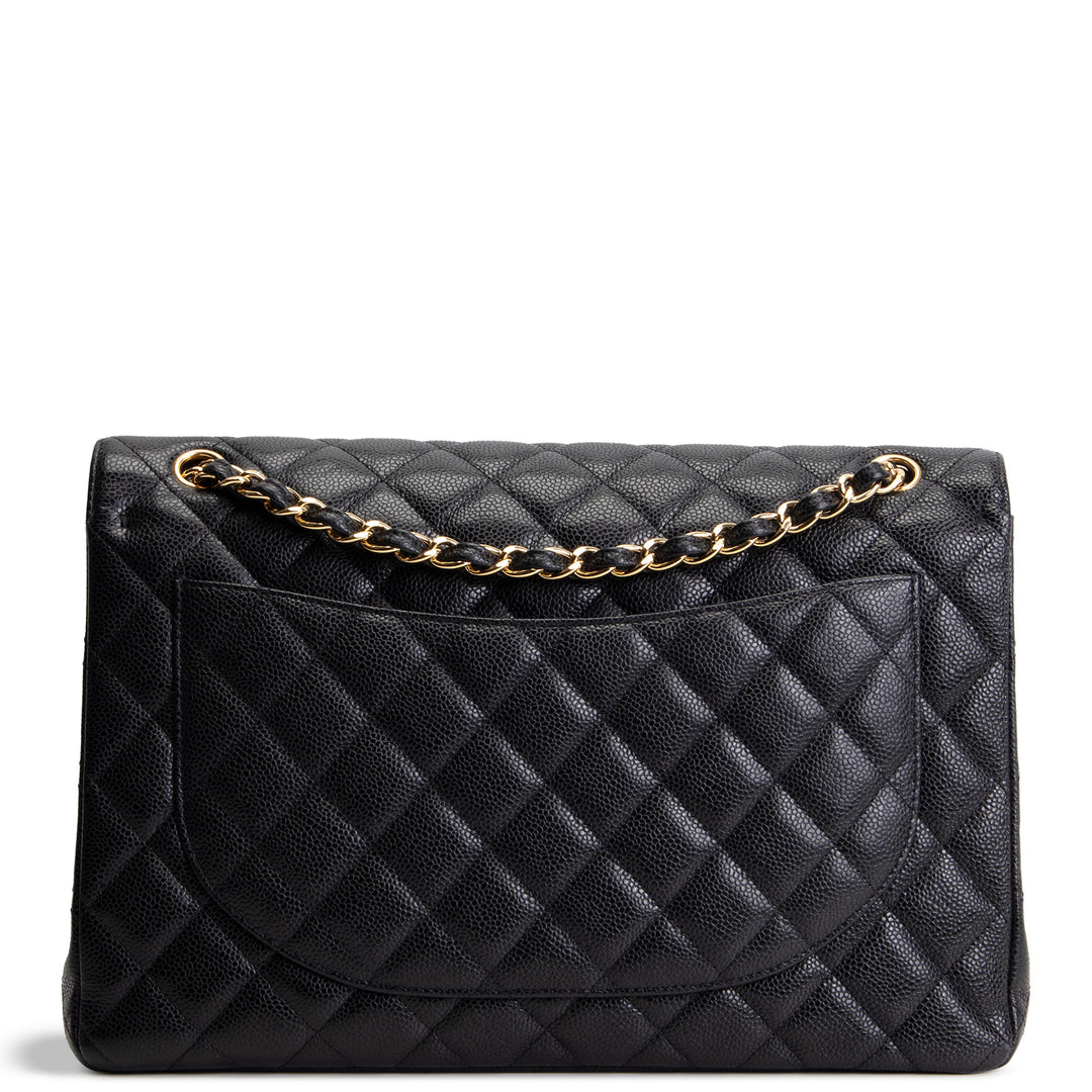 CHANEL Quilted Caviar Maxi Double Flap Bag - Black