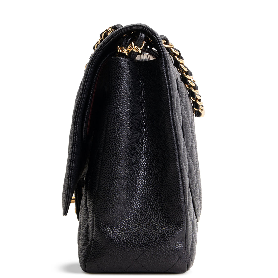 CHANEL Quilted Caviar Maxi Double Flap Bag - Black