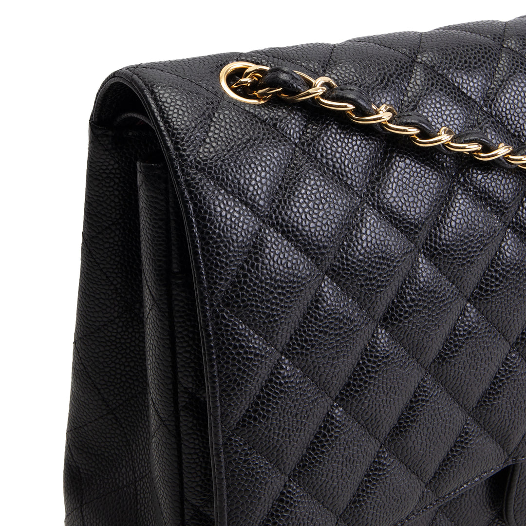 CHANEL Quilted Caviar Maxi Double Flap Bag - Black