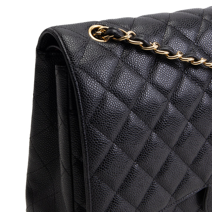 CHANEL Quilted Caviar Maxi Double Flap Bag - Black