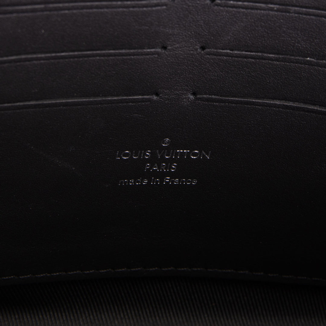 LOUIS VUITTON Taurillon Soft Trunk Wallet - Black