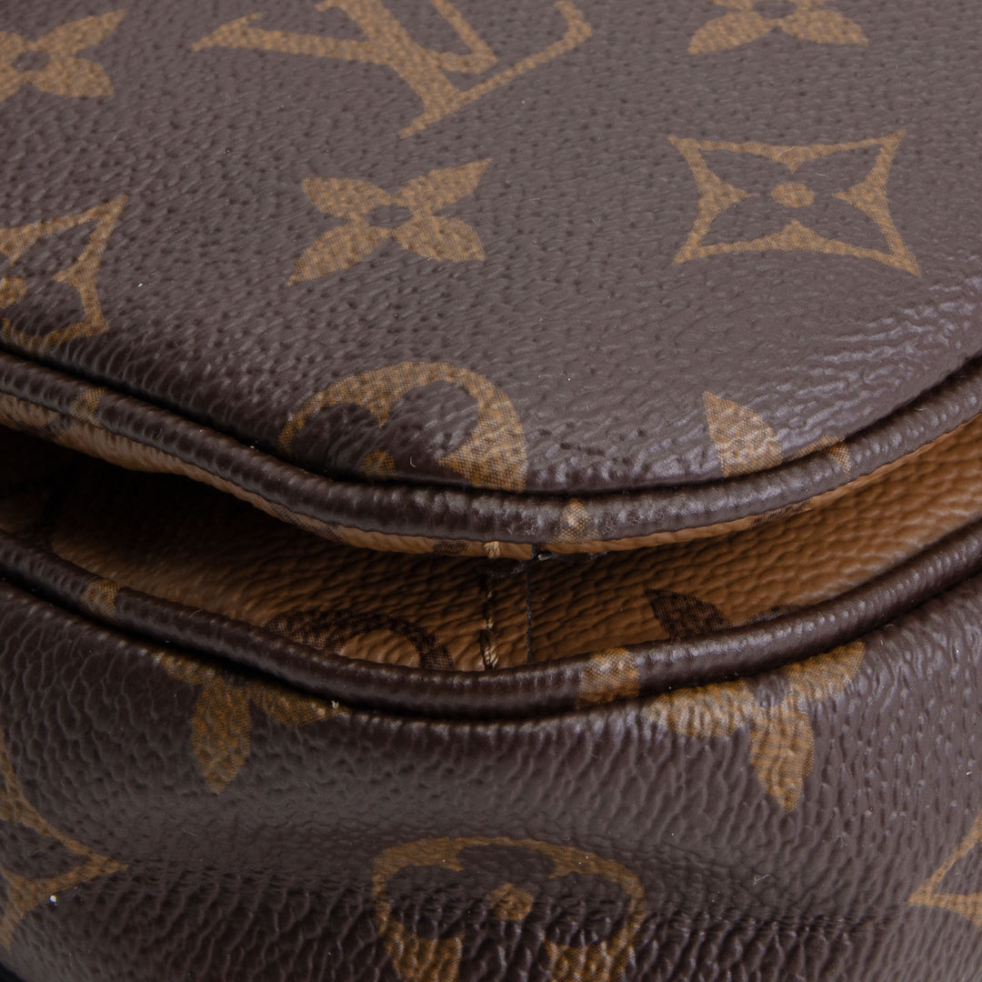 LOUIS VUITTON  Reverse Monogram Pochette Metis