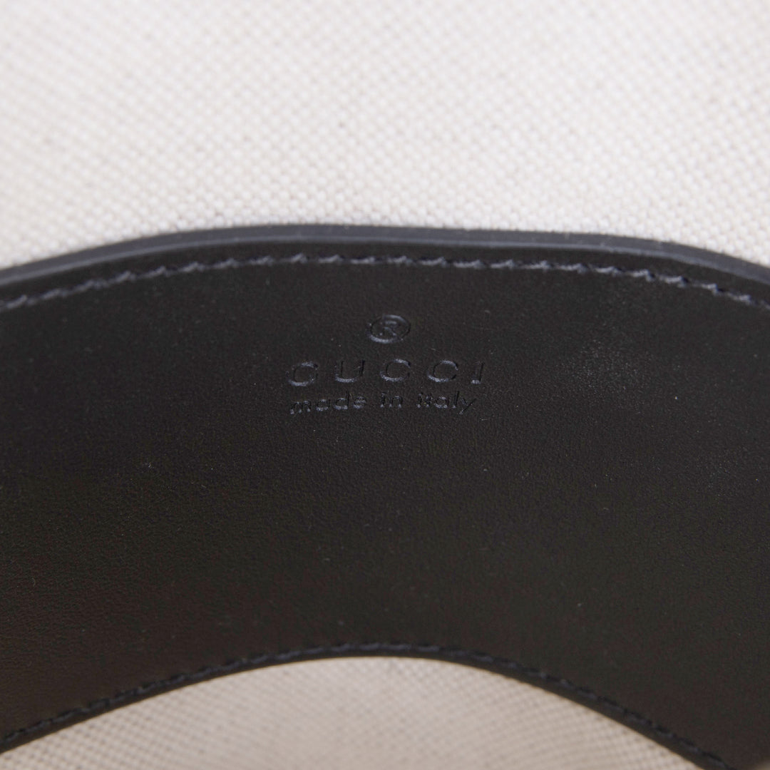 GUCCI Embossed Sling - Black