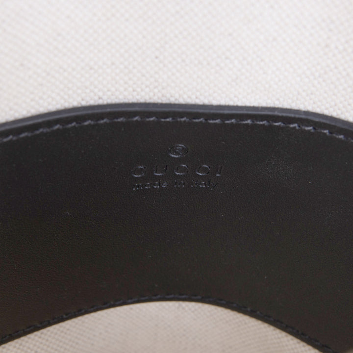 GUCCI Embossed Sling - Black