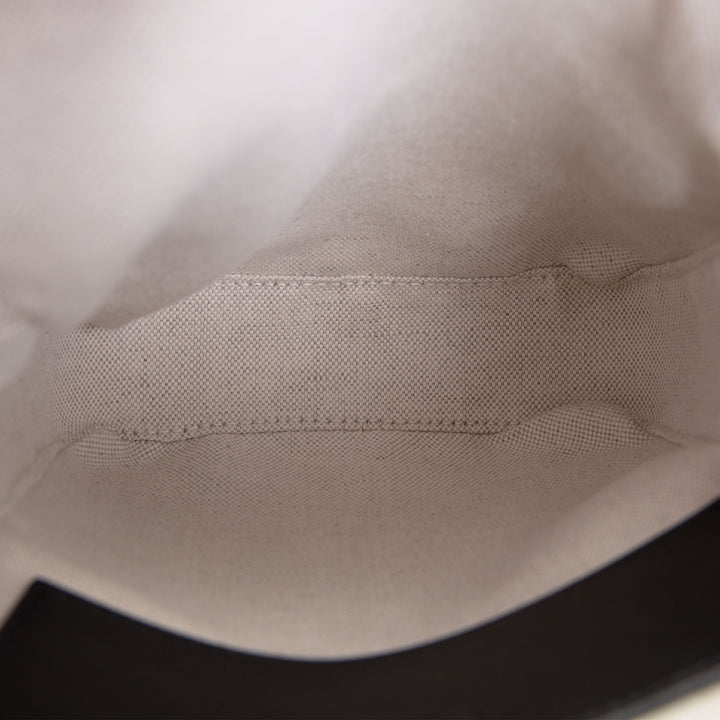 GUCCI Embossed Sling - Black