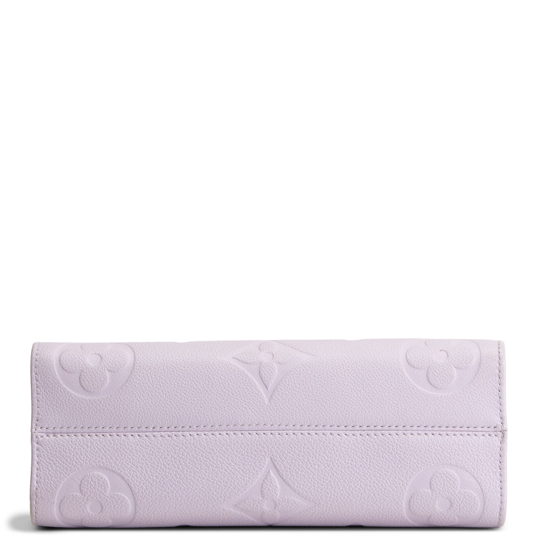LOUIS VUITTON Empreinte Giant Monogram OnTheGo East West - Lavender