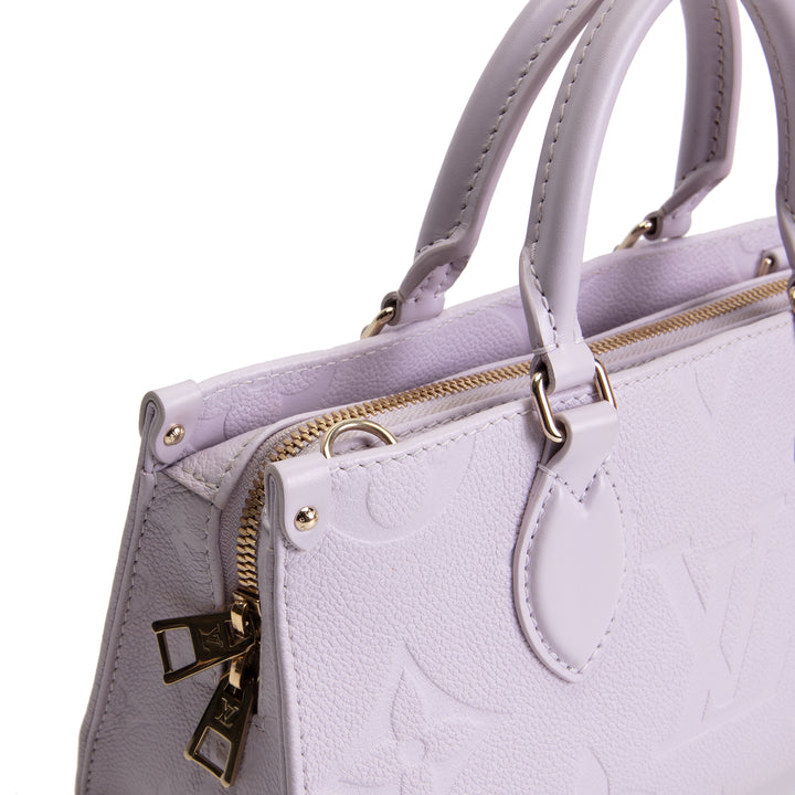 LOUIS VUITTON Empreinte Giant Monogram OnTheGo East West - Lavender