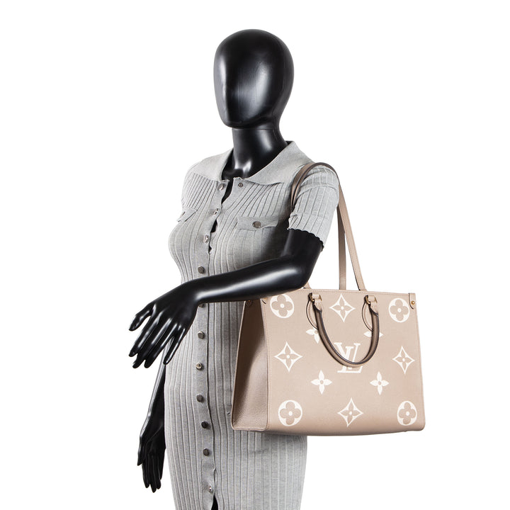 LOUIS VUITTON Bicolor Empreinte OntheGo MM - Dove/Cream