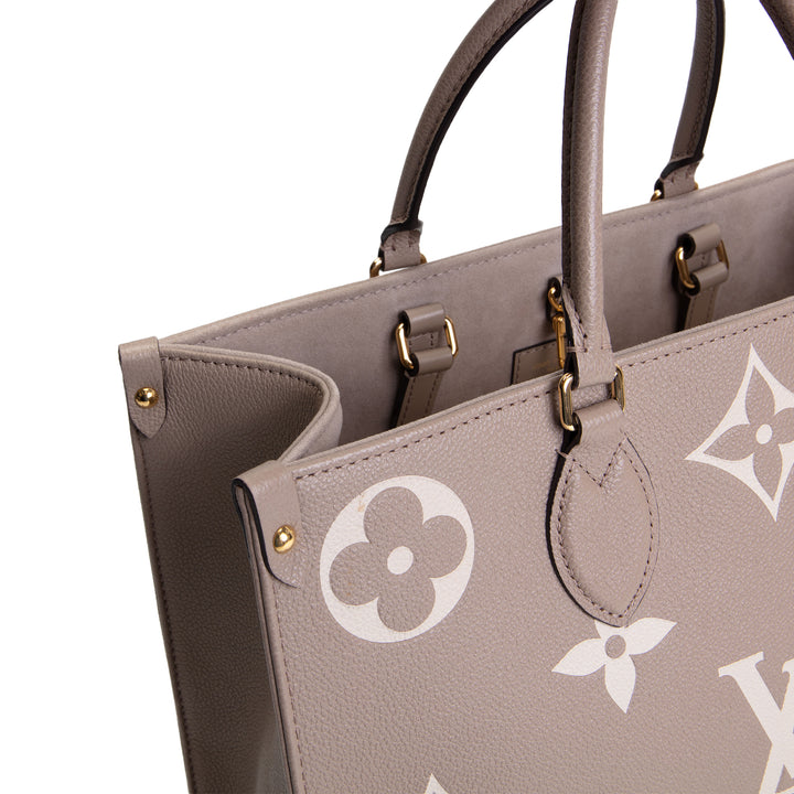 LOUIS VUITTON Bicolor Empreinte OntheGo MM - Dove/Cream