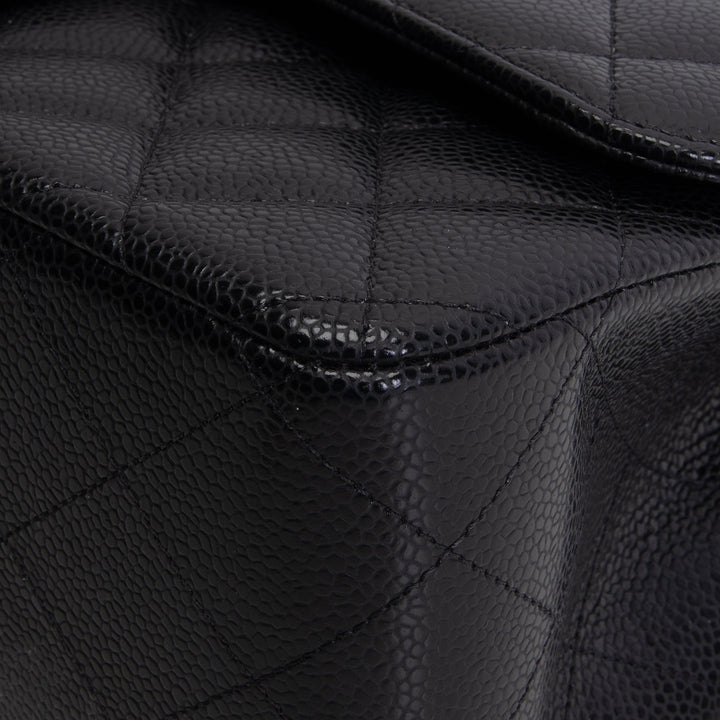 CHANEL Jumbo Double Flap - Quilted Caviar - Black