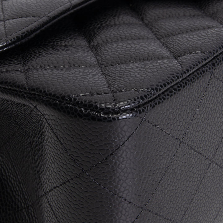 CHANEL Jumbo Double Flap - Quilted Caviar - Black