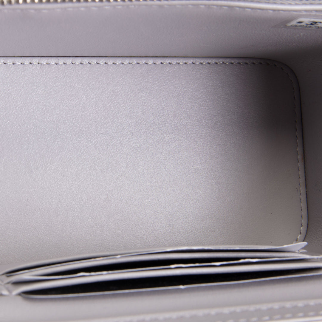 CHANEL Small Vanity Case - Metallic Silver Quilted Caviar