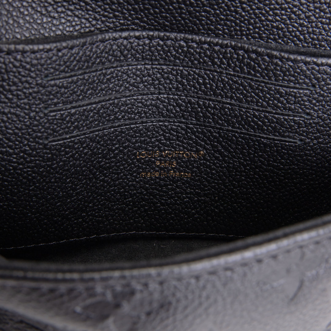 LOUIS VUITTON Madeleine Nano Empreinte - Black
