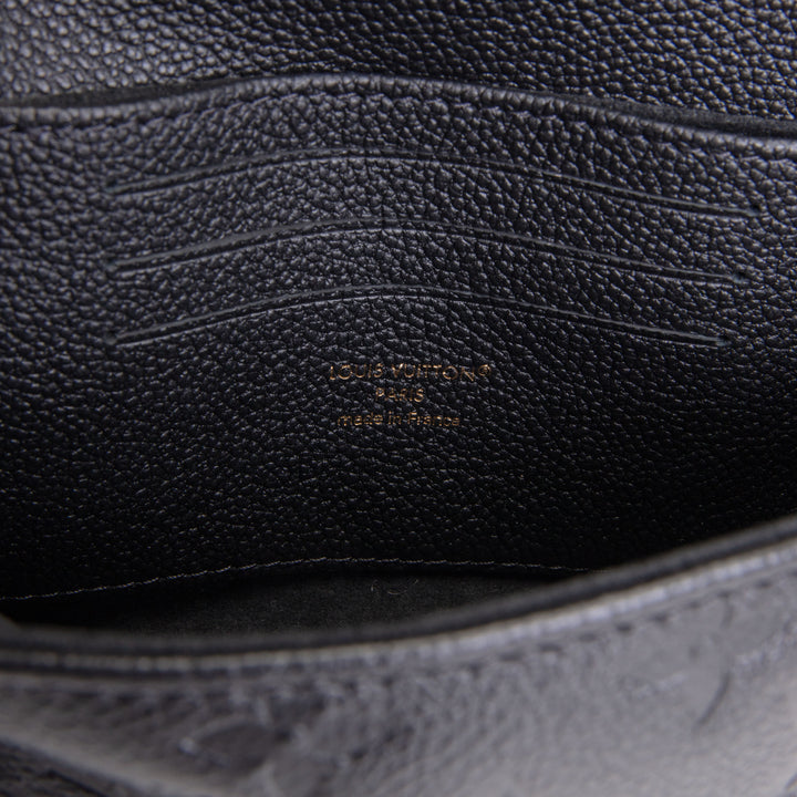 LOUIS VUITTON Madeleine Nano Empreinte - Black