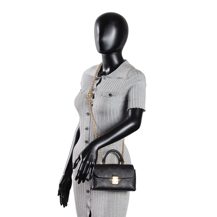 LOUIS VUITTON Madeleine Nano Empreinte - Black