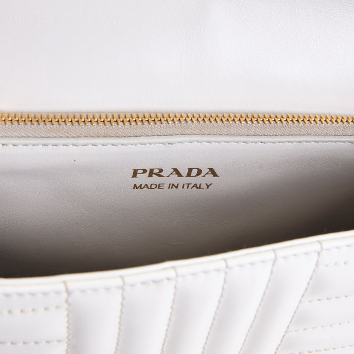 PRADA Curve Flap Diagramme Quilted Leather Bag - White