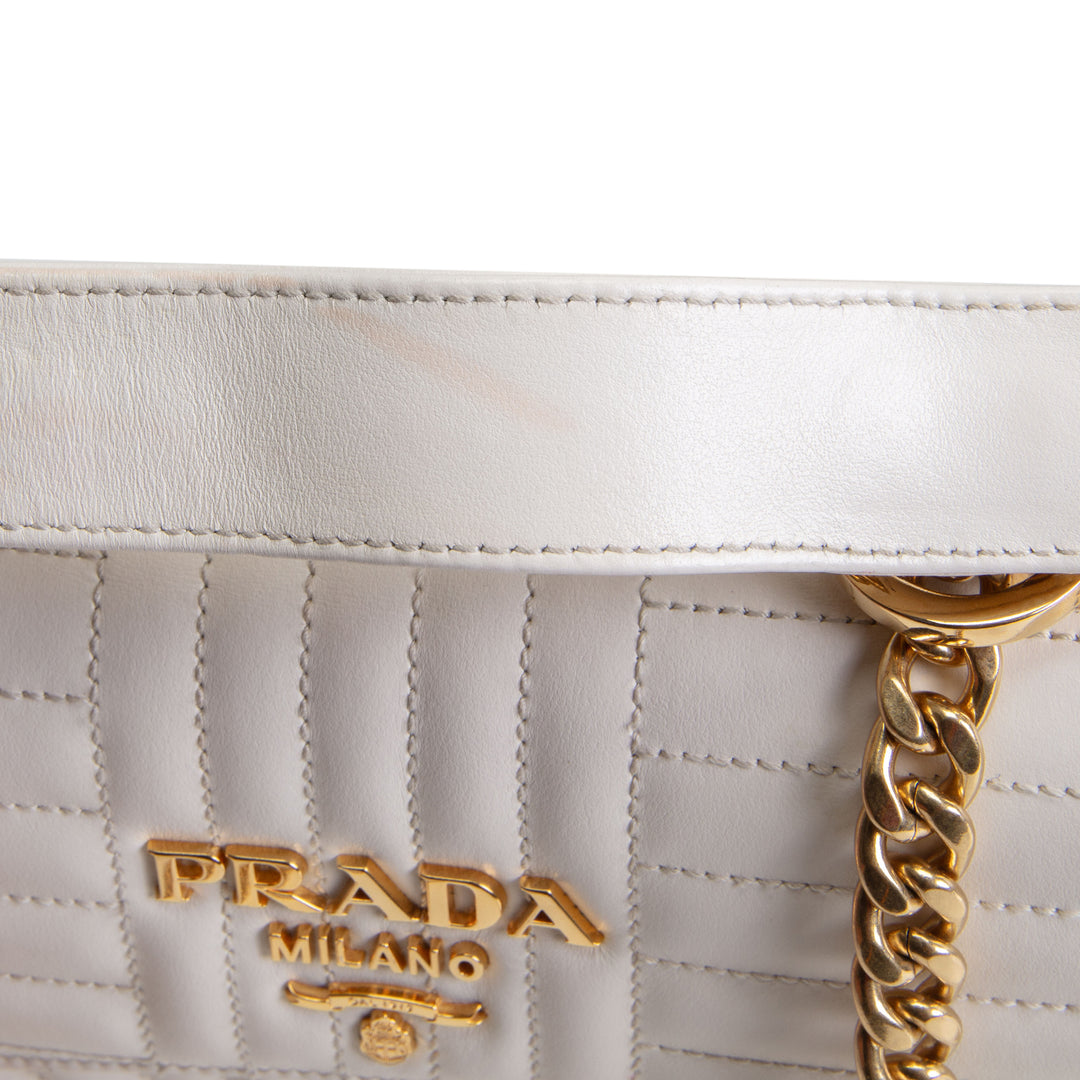 PRADA Curve Flap Diagramme Quilted Leather Bag - White