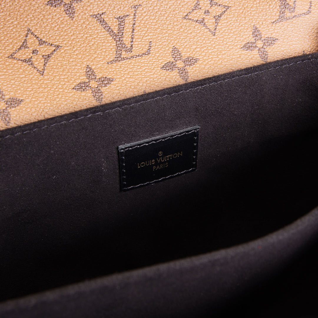 LOUIS VUITTON Reverse Monogram Pochette Metis