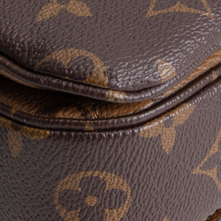 LOUIS VUITTON Reverse Monogram Pochette Metis