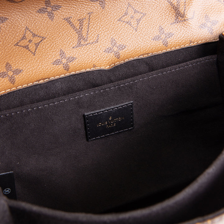 LOUIS VUITTON Monogram Reverse Pochette Metis