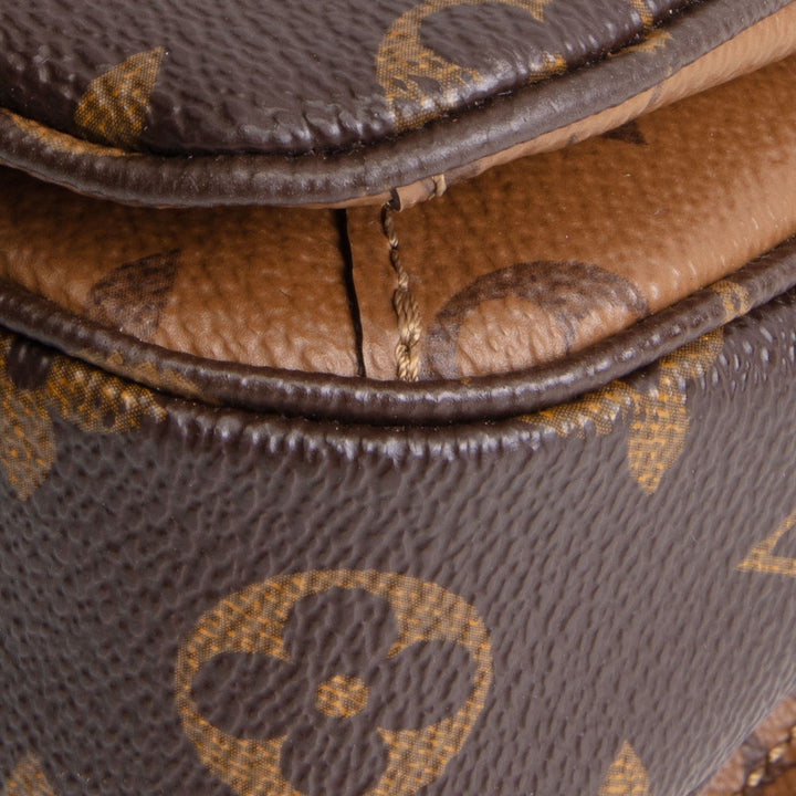 LOUIS VUITTON Monogram Reverse Pochette Metis