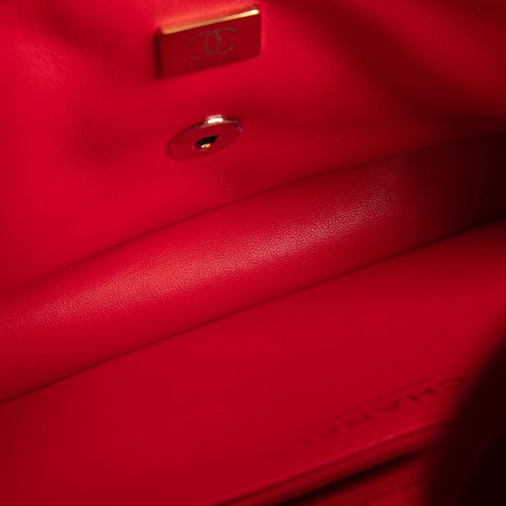 CHANEL Quilted Jersey Roll Clutch