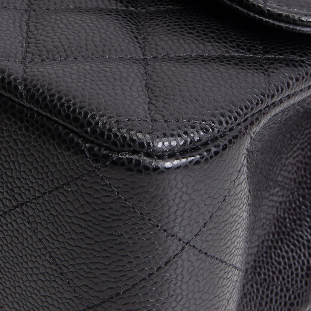 CHANEL Quilted Caviar Jumbo Double Flap Bag - Black