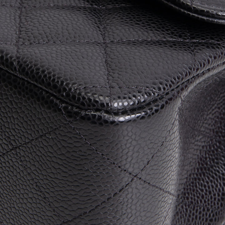 CHANEL Quilted Caviar Jumbo Double Flap Bag - Black