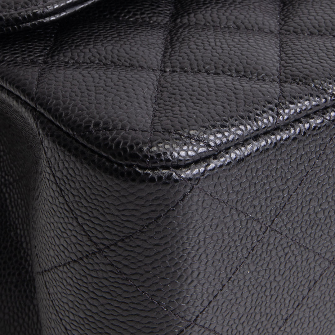 CHANEL Quilted Caviar Jumbo Double Flap Bag - Black