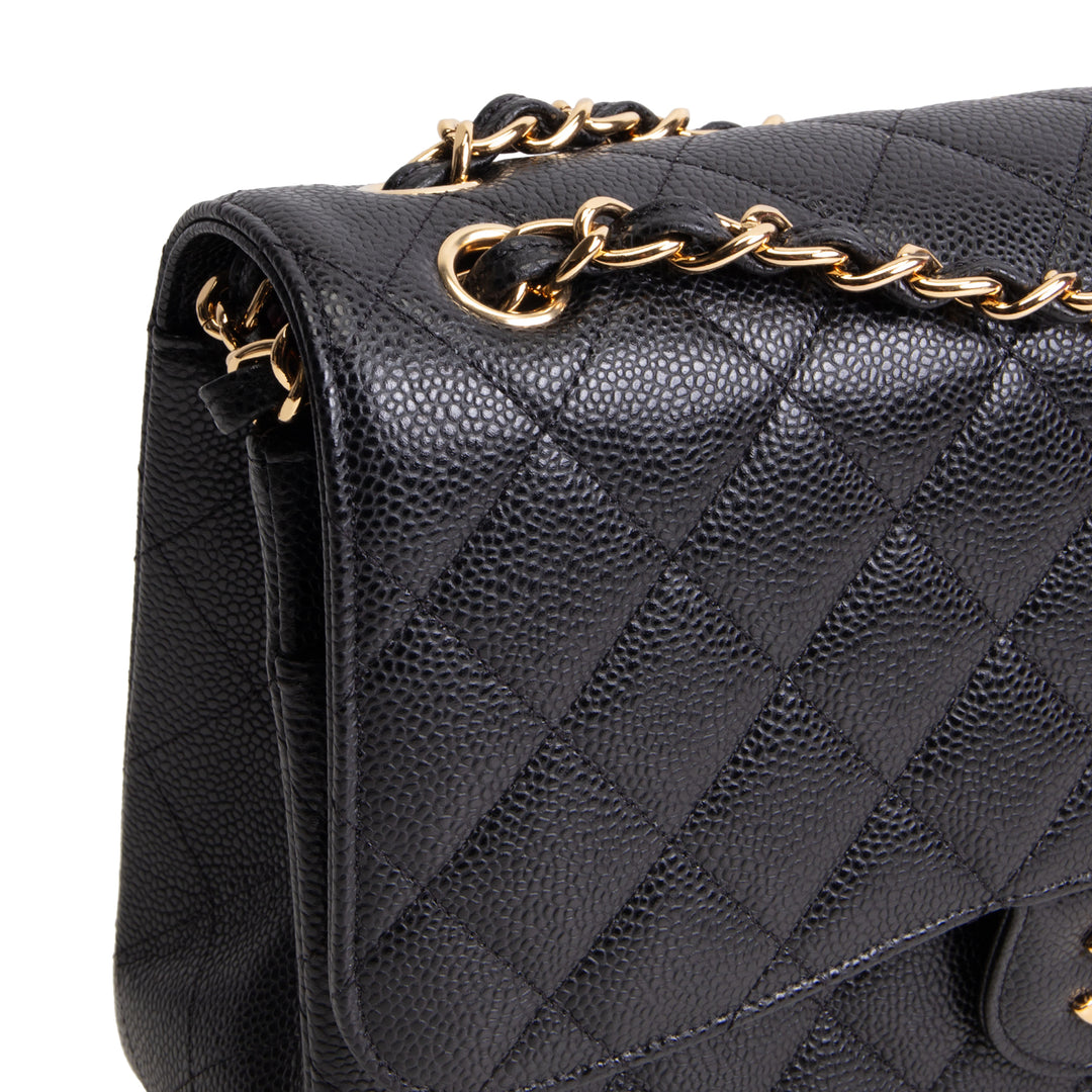 CHANEL Quilted Caviar Jumbo Double Flap Bag - Black