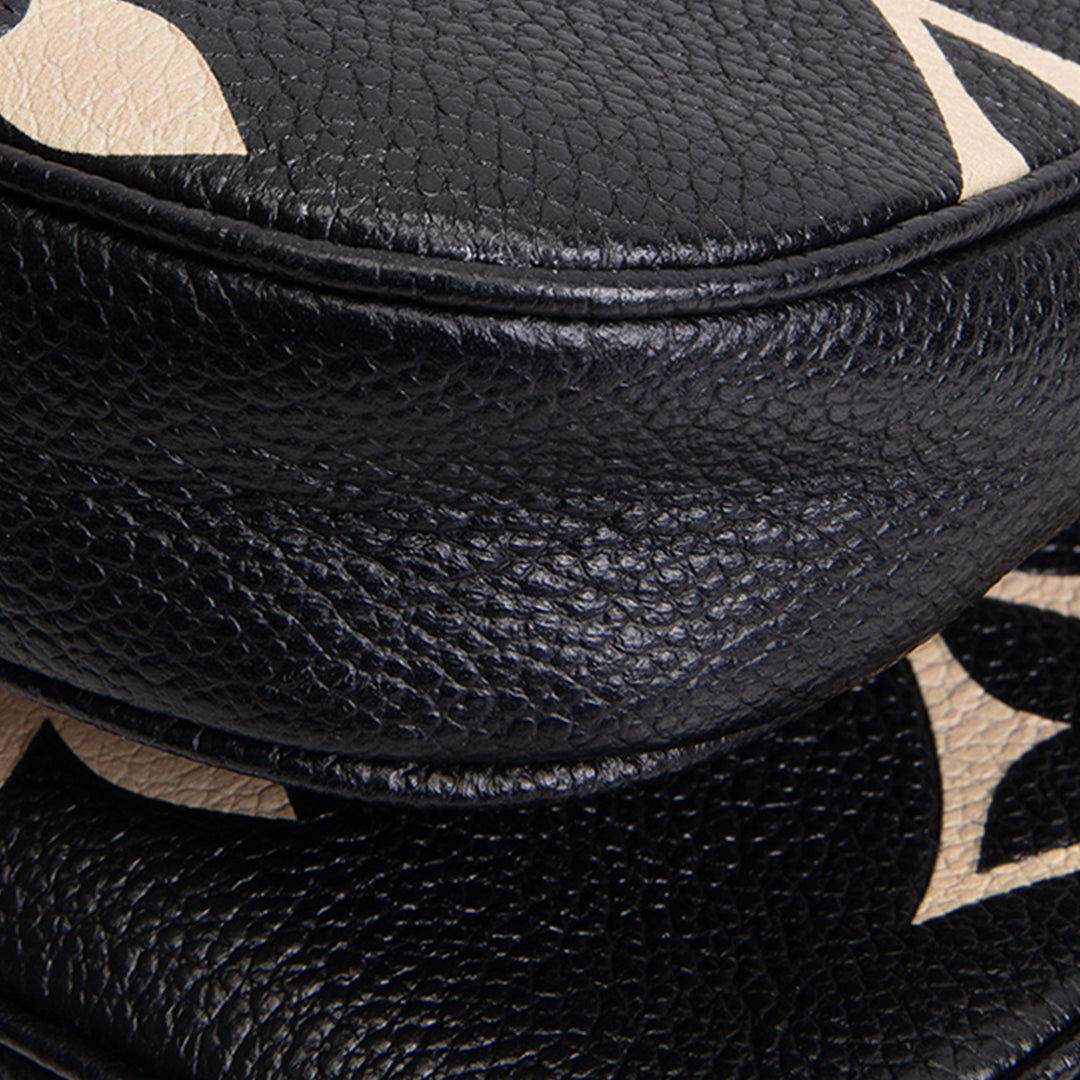 LOUIS VUITTON Monogram Bicolor Empreinte Multi Pochette Accessoires - Black/Cream