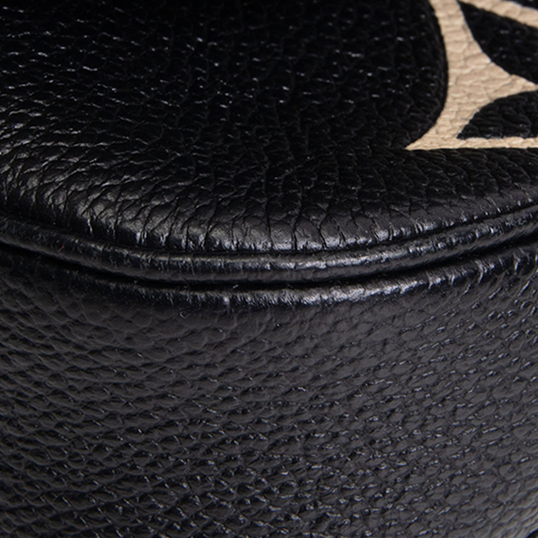 LOUIS VUITTON Monogram Bicolor Empreinte Multi Pochette Accessoires - Black/Cream