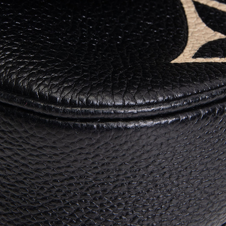 LOUIS VUITTON Monogram Bicolor Empreinte Multi Pochette Accessoires - Black/Cream