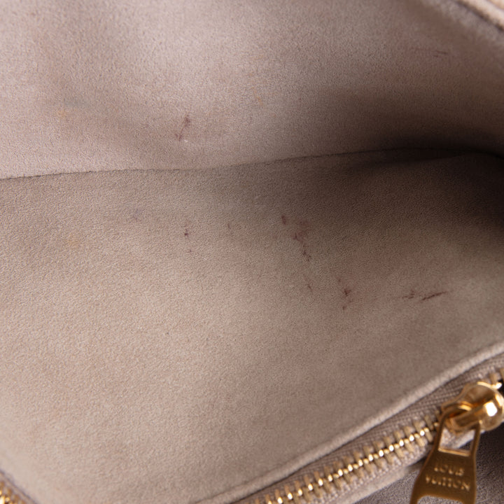 LOUIS VUITTON Empreinte Monogram Giant Pochette Metis East West