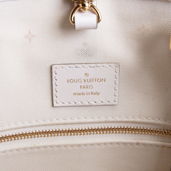 LOUIS VUITTON OnTheGo Giant Monogram Empreinte Spring In The City Sunset MM - Khaki OUTLET FINAL SALE