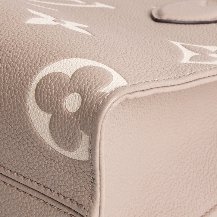 LOUIS VUITTON Monogram Empreinte Bicolor OnTheGo PM - Dove/Cream