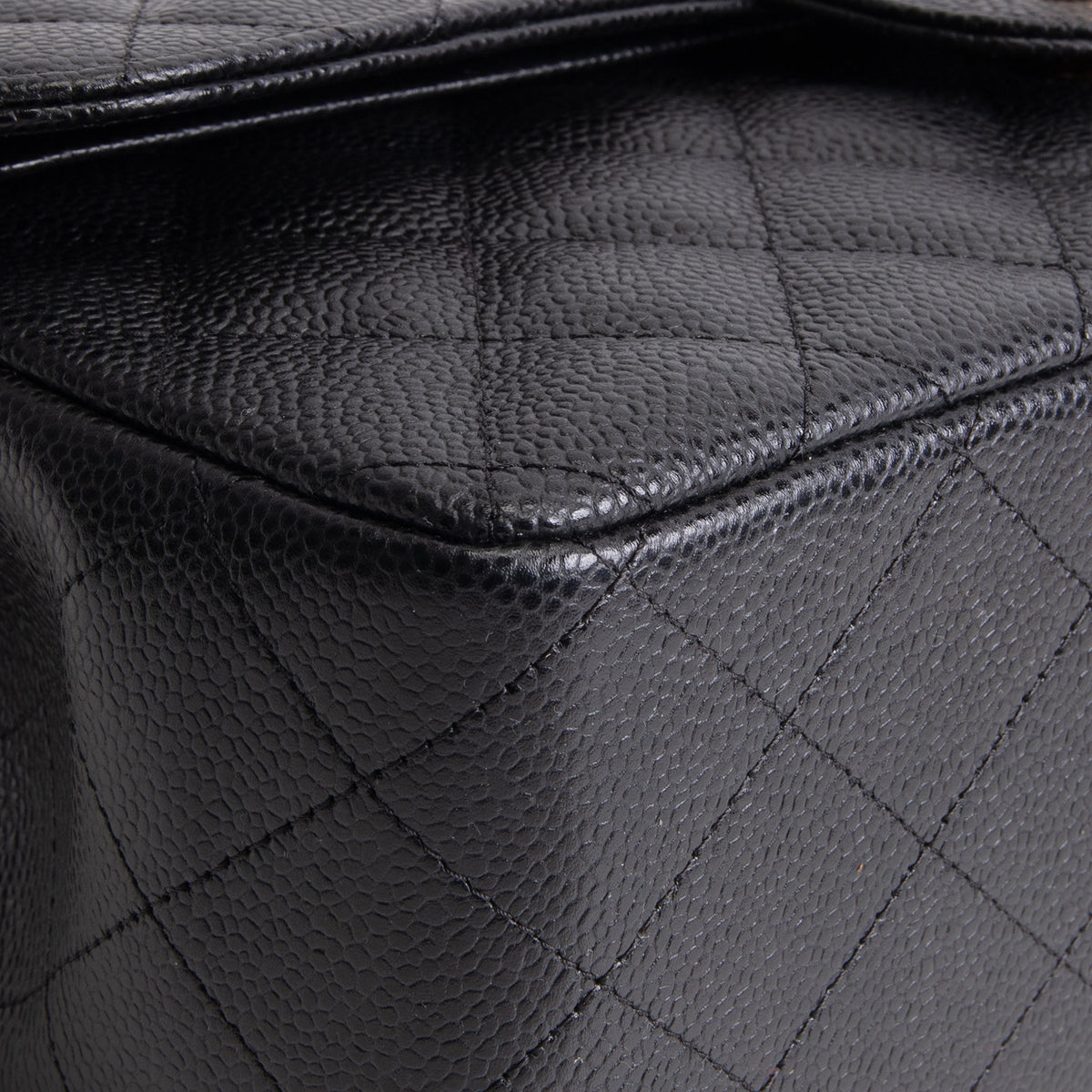 CHANEL Caviar Jumbo Double Flap Bag - Black